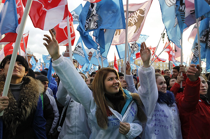 Russia protests: Activists from the pro-Kremlin youth movement Nashi (Ours) celebrate 