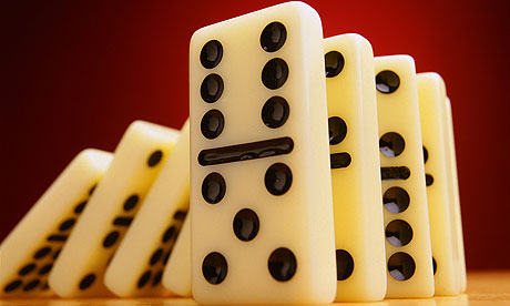 Dominoes falling in a line