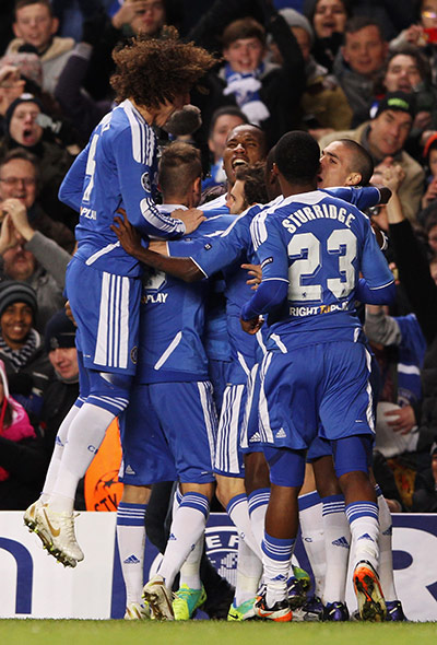 Wednesday Champ League: Didier Drogba celebrates with team-mates after scoring against Valencia