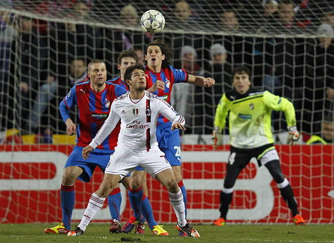 wednesday Champ League: Pato of AC Milan heads a ball