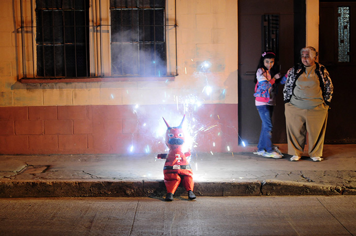 24 hours in pictures: 'Devils Burning' ceremony in Guatemala