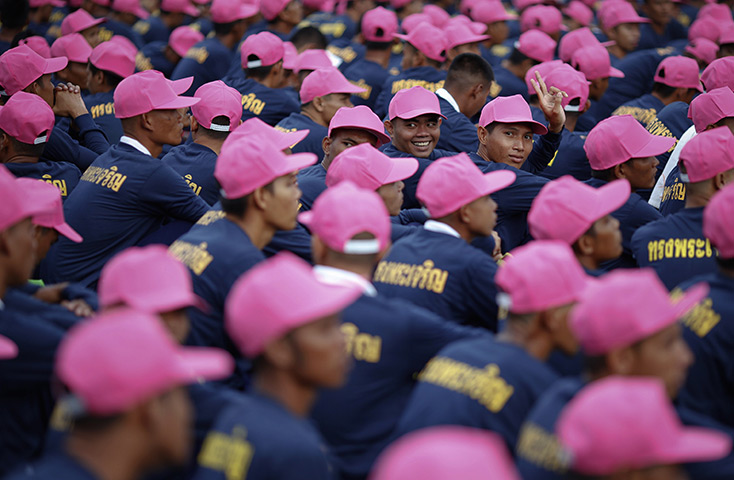 24 hours in pictures: A prisoner shows a victory sign at the Bang Kwang Central Prison