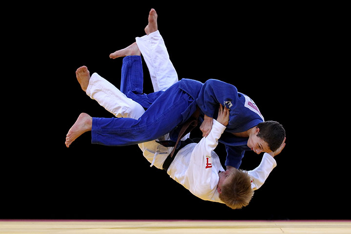 The week in sport: Austin Jones and Tom Johnson grabble during a training session