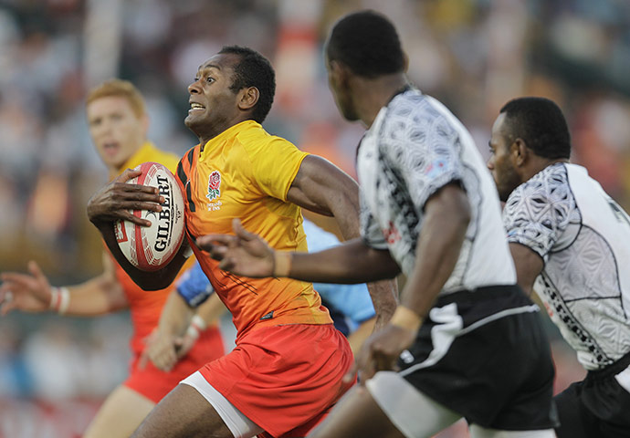 The week in sport: England's Isoa Damu streaks away from the Fiji defence as he scores a try