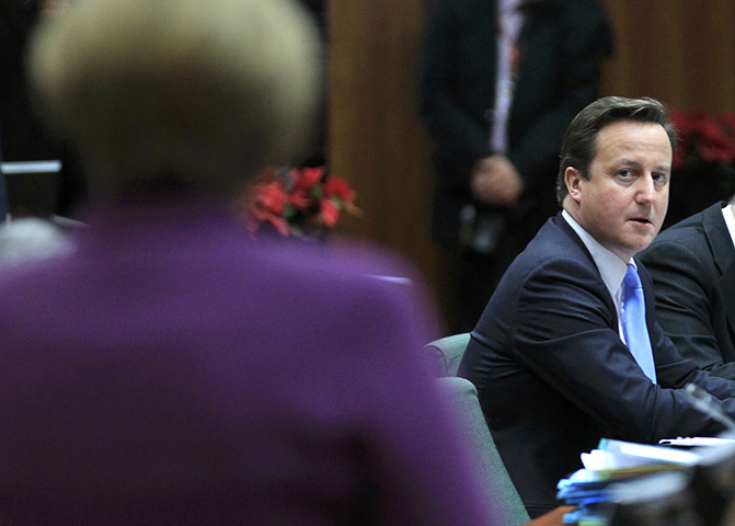 European Union Summit: David Cameron looks at Angela Merkel