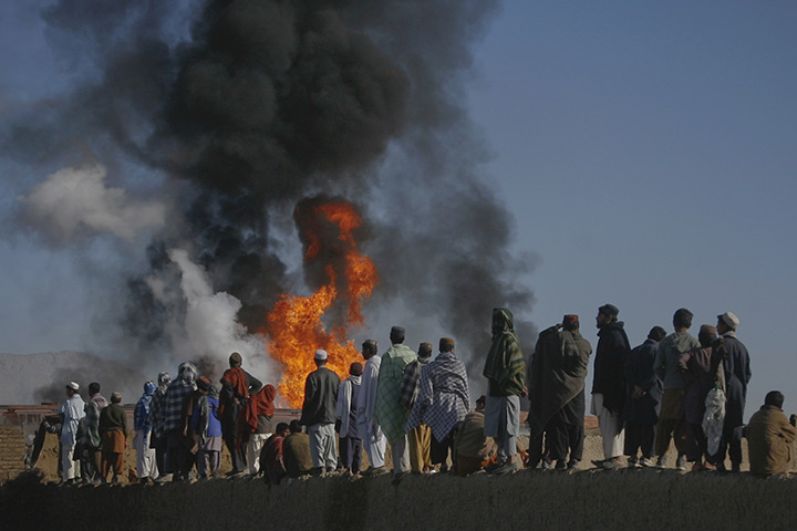24 hours in pictures: Quetta, Pakistan: Smoke and flames from fuel tankers which were set ablaze