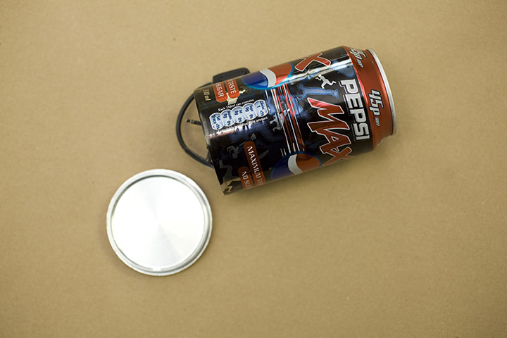 Benefit Fraud: camera in Pepsi can