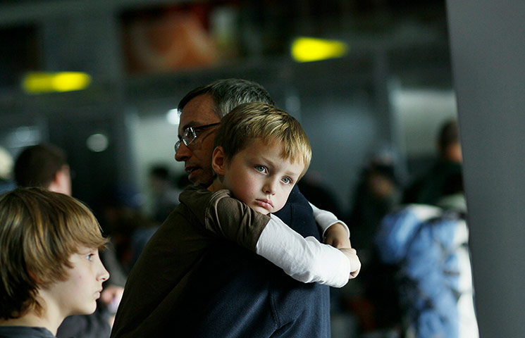 Egypt protests: Americans wait to be evacuated at Cairo International Airport 