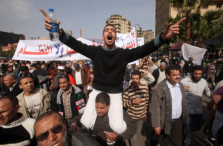 Egypt protests: A protester gestures during an anti-Mubarak protest in Cairo