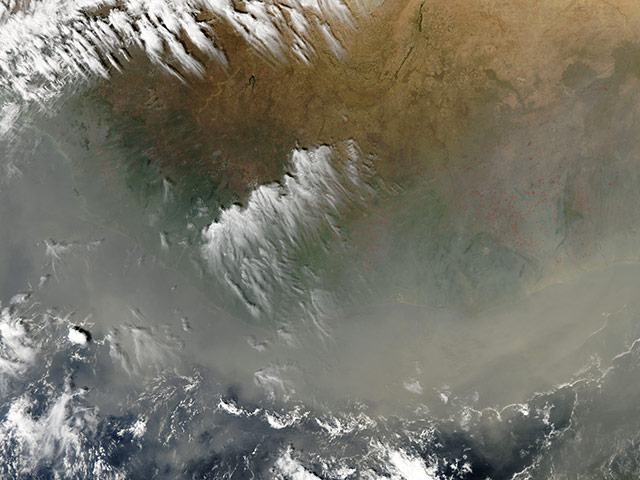 Satellite Eye on Earth: Dust from a powerful Saharan storm mixed with smoke from hundreds of fires