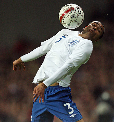 Denmark v England: Ashley Cole chests the ball down