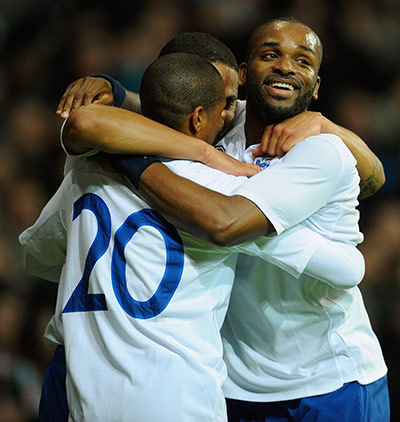 Denmark v England: Darren Bent, Glen Johnson celebrate with goalscorer Ashley Young