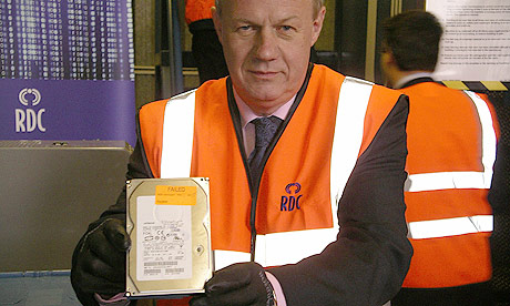 ID register shredded: Damian Green holding hard drive
