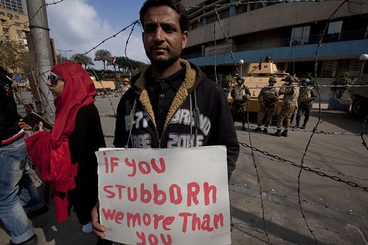 Sean Smith in Cairo: Protesters and soldiers outside the Egyptian State TV centre
