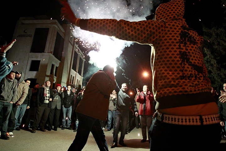 Egypt reaction: Protesters celebrate in front of the Egyptian embassy in Amman