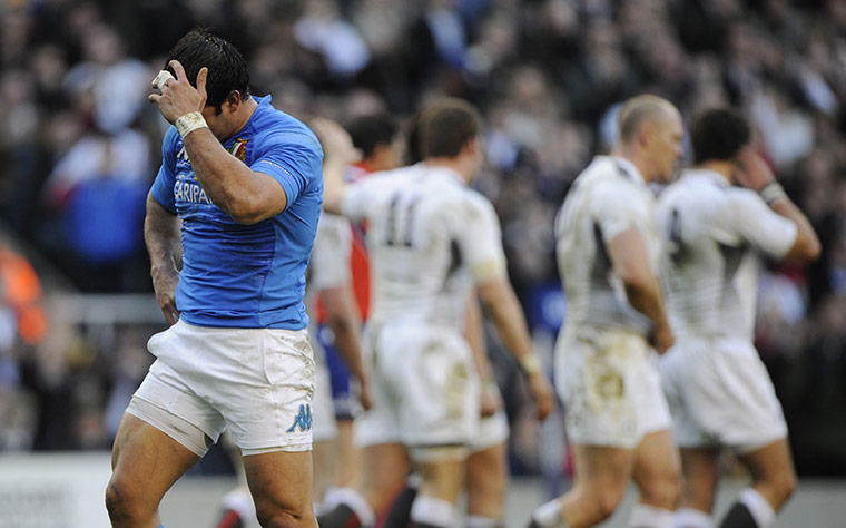 England v Italy: Andrea Masi holds his head after the third England try