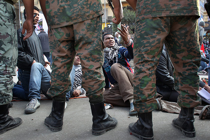 Egypt aftermath: Egyptians stage a sit-in after the army  remove encampmennts