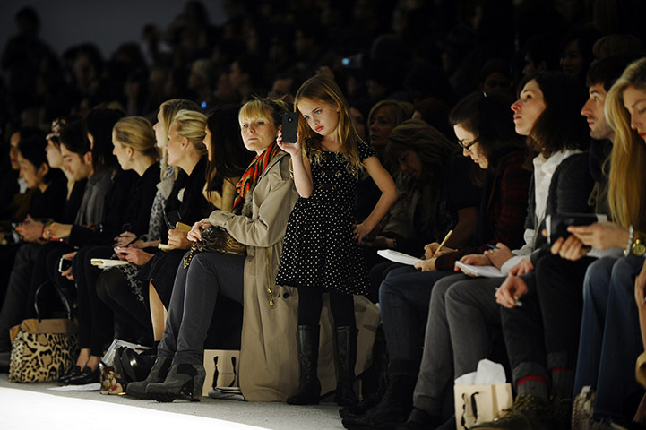 NYFW day 3: Child takes video as a model during Jill Stuart show, New York Fashion Week