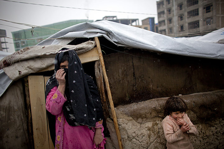 24 hours in pictures: An Afghan family living in makeshift tents
