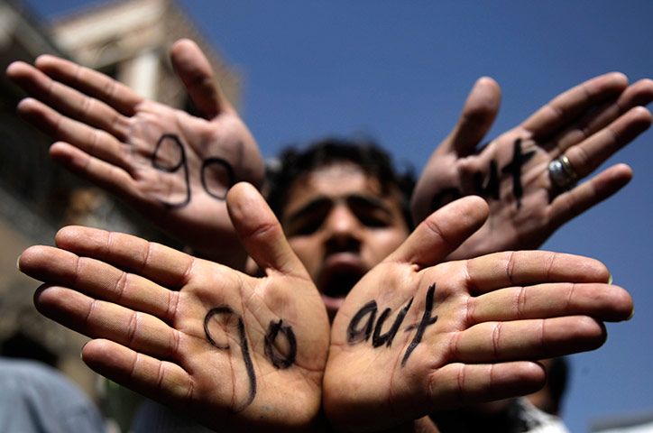 24 hours in pictures: Anti-government protesters display their painted hands, Yemen