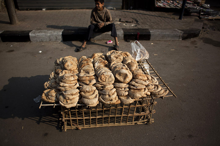 egypt day 21: A boy sells bread in Tahrir Square, Cairo 