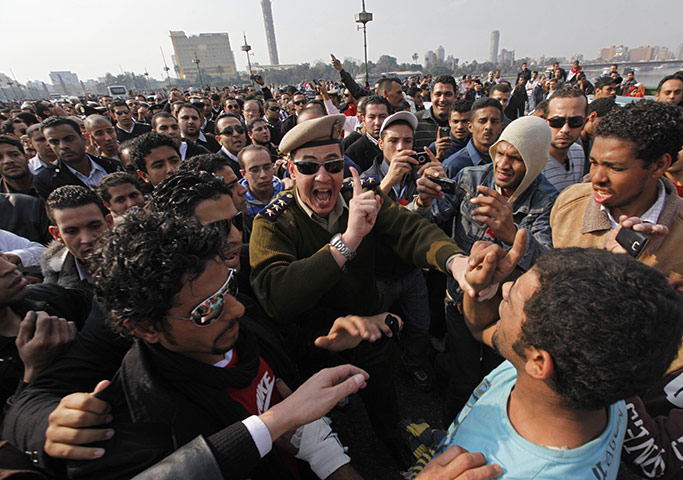 egypt protests day 21: police march in tahrir square