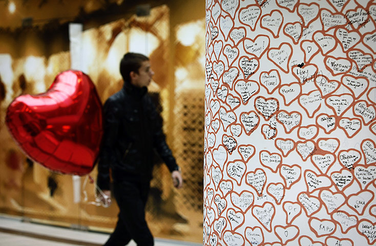 Valentine's Celebrations: A Bulgarian carries a red heart balloon