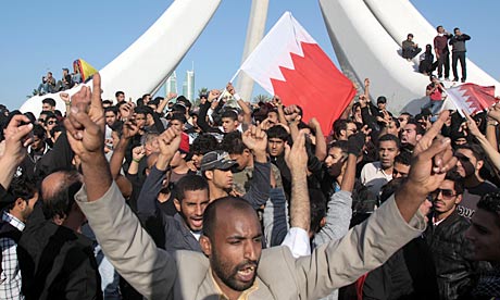 Bahraini protesters chant and wave flags in Egypt-style rebellion in the capital Manama