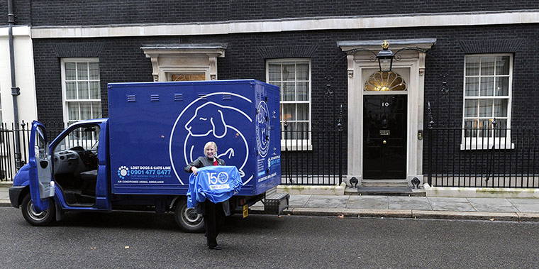 Larry the Downing St cat: CEO of Battersea Dogs and Cats home Claire Horton carries Larry the cat