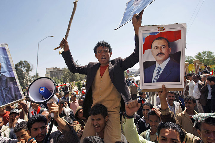 Protests spread: Sana'a, Yemen: Supporters of the Yemeni government shout slogans