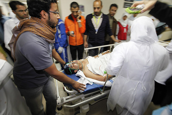 bahrain: An injured protester is rushed to the operating theatre in a hospital 