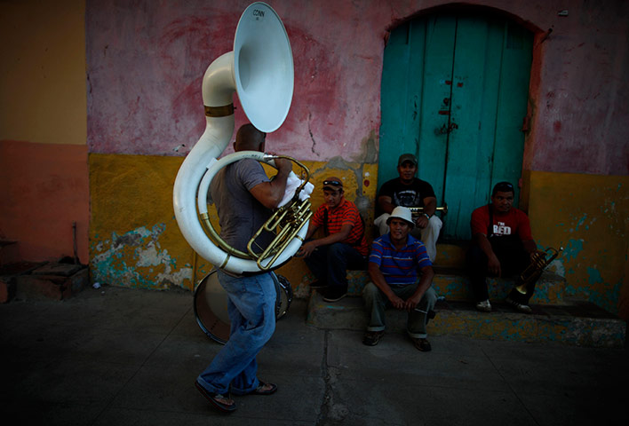24 hours in pictures: Band members rest at the international poetry festival