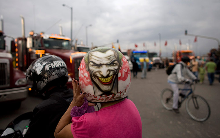 24 hours in pictures: Motorcycle riders stop on an avenue in Bogotá, Colombia