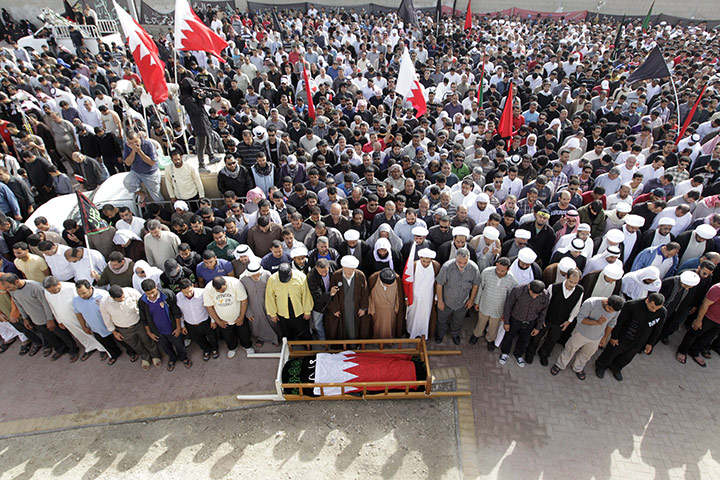 Bahrain Funeral : Mourners pray during the funeral for 22-year-old Mahmoud Maki Abu Taki