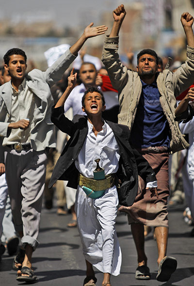 Yemen Protests: Yemeni anti-government demonstrators chant slogans