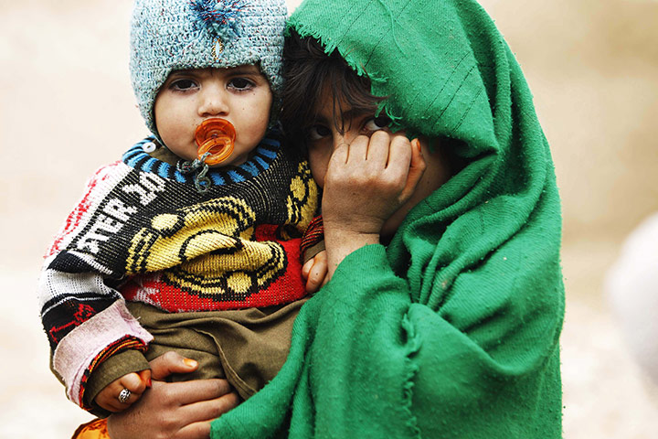 24 Hours In Pix: Afghan children