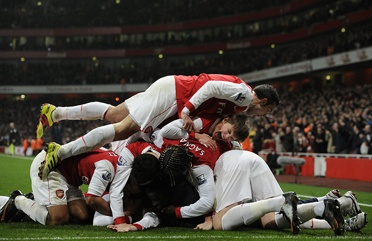Tuesday Premier League: Arsenal players celebrate the winner
