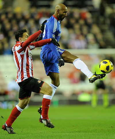 Tuesday Premier League: Nicolas Anelka tussles for the ball