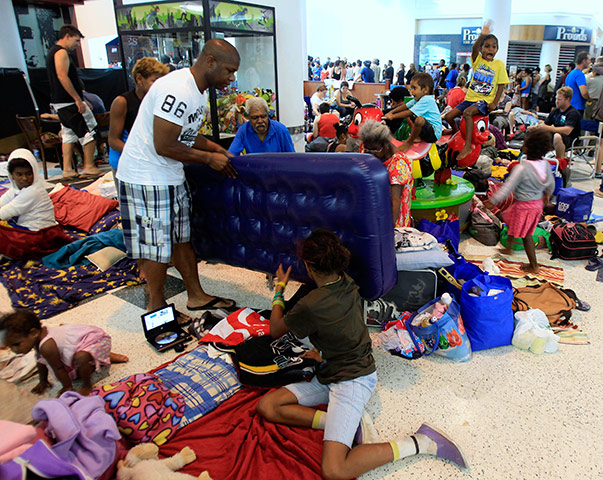Cyclone Yasi preparations: People pack a shopping mall used as an evacuation shelter in Cairns