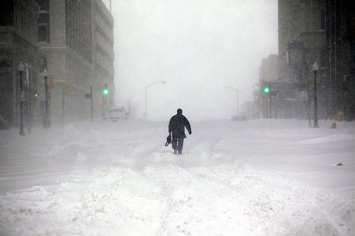 US White Out: Tim Houchin walks in the snow to work