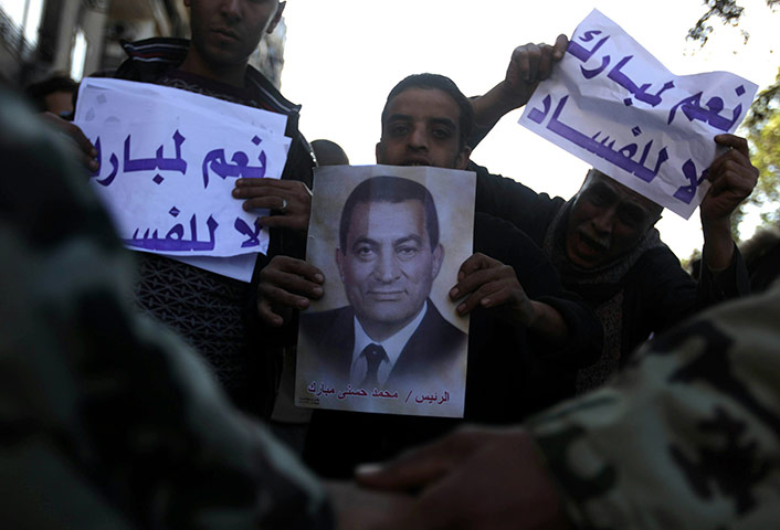 24 hours in pictures: Supporters of Egyptian President Hosni Mubarak