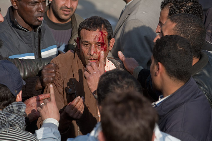 Sean Smith in Cairo: Pro President and anti government demonstrators clash in Tahrir Square