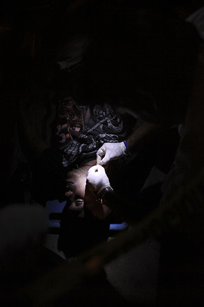 FTA Alexandre Meneghini: A forensic specialist and the body of a man killed in a poor neighbourhood