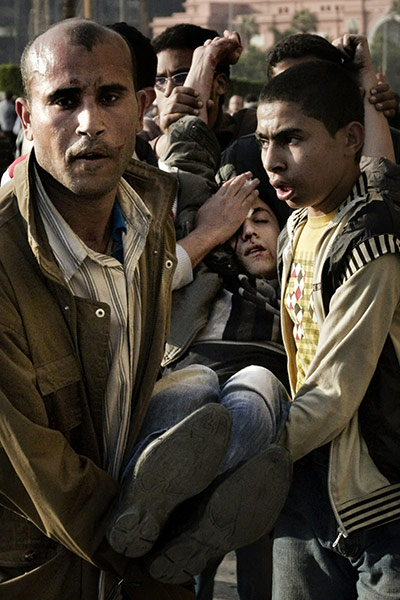 Battle for Egypt: Demonstrators for and against the government clash in Cairo