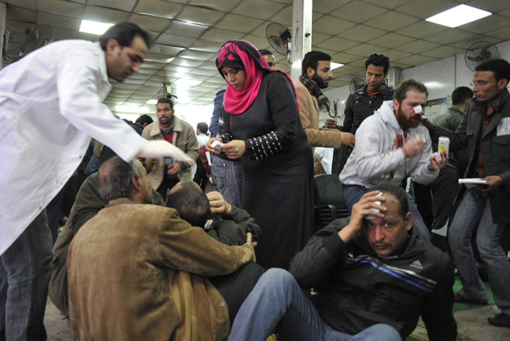 Battle for Egypt: Demonstrators for and against the government clash in Cairo