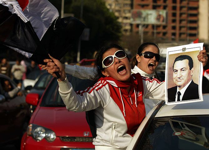 Battle for Egypt: Demonstrators for and against the government clash in Cairo
