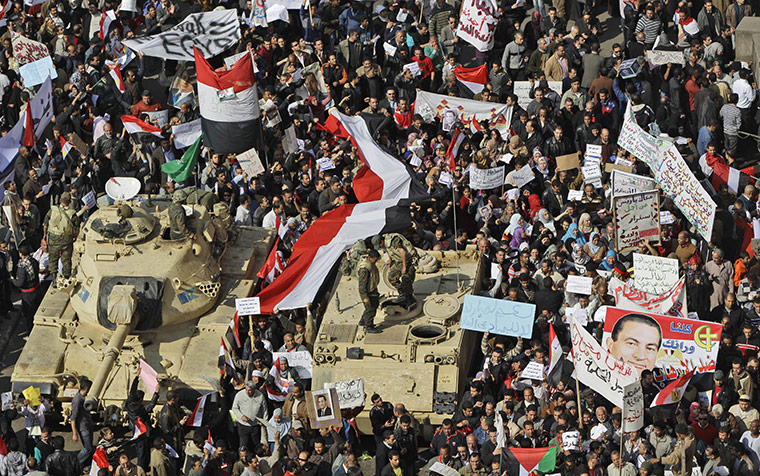 Battle for Egypt: Demonstrators for and against the government clash in Cairo