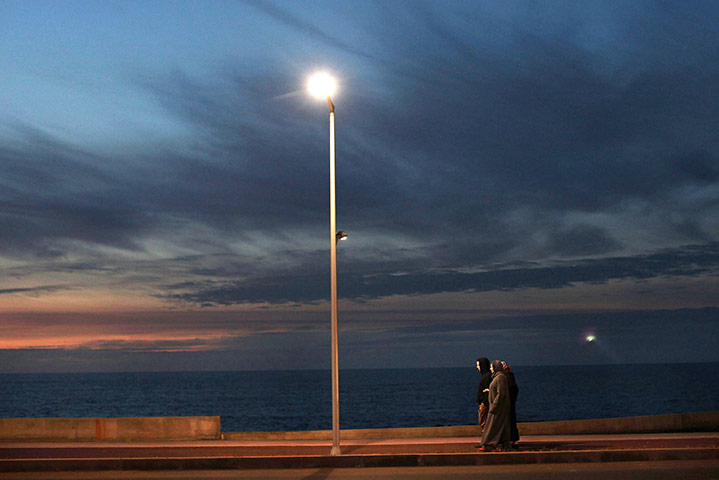 24 hours: Rabat, Morocco: Women walk along the seafront 