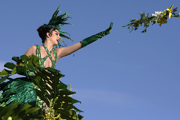 24 hours: Nice, France: A woman takes part in the parade at the 127th Nice carnival 
