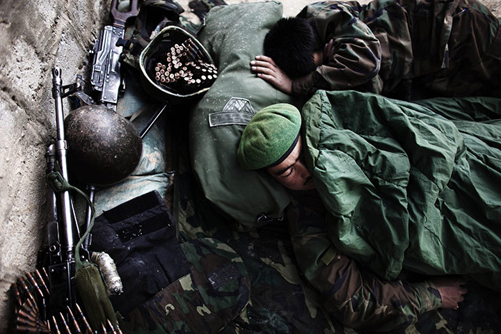 24 hours: Kunjak, Afghanistan: Afghan National Army soldiers sleep between operations